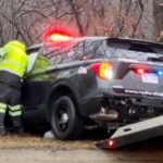 Dashcam Video Shows Redford Township, Michigan Police Cruiser Lose Control in Standing Water Before Slamming Into Pole