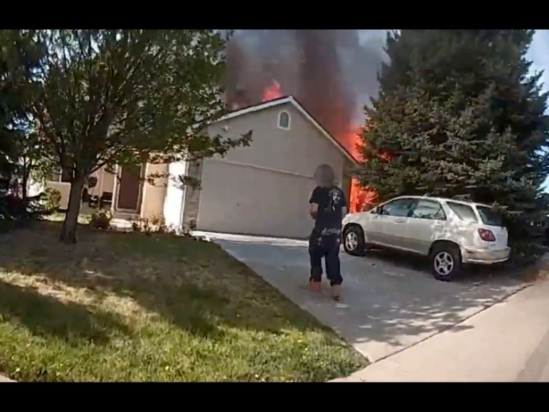 Colorado Deputy Kicks Door Open in One Shot at House Fire and Rescues Dog Hiding Under Backyard Trampoline